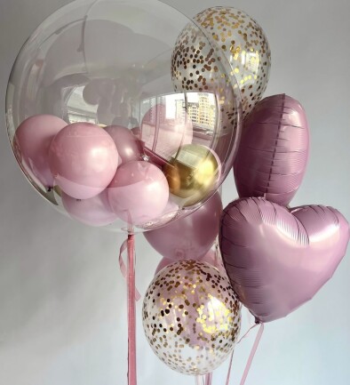 An elegant display of balloons in delicate pink and gold hues. photo 394x433